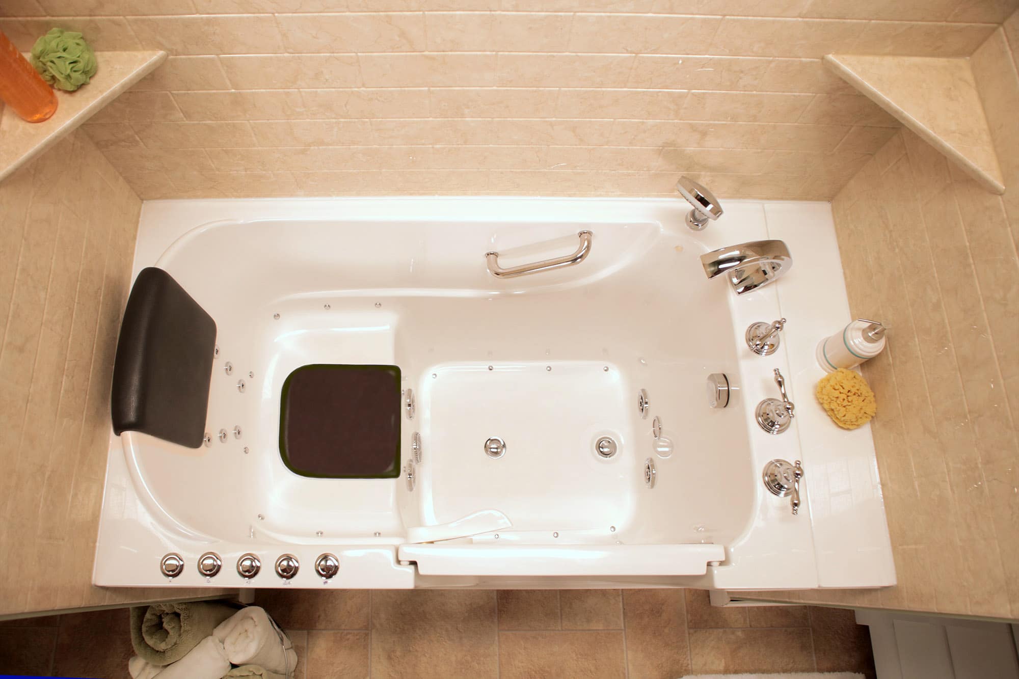 Completed bathroom with a replacement bathtub and surround